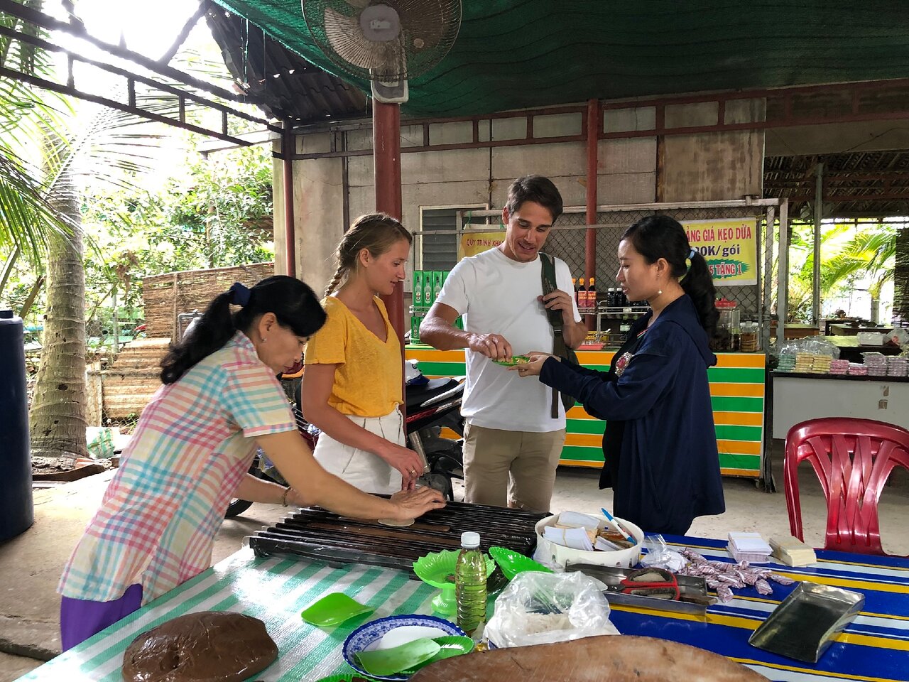 The coconut candy-making process at the workshop 